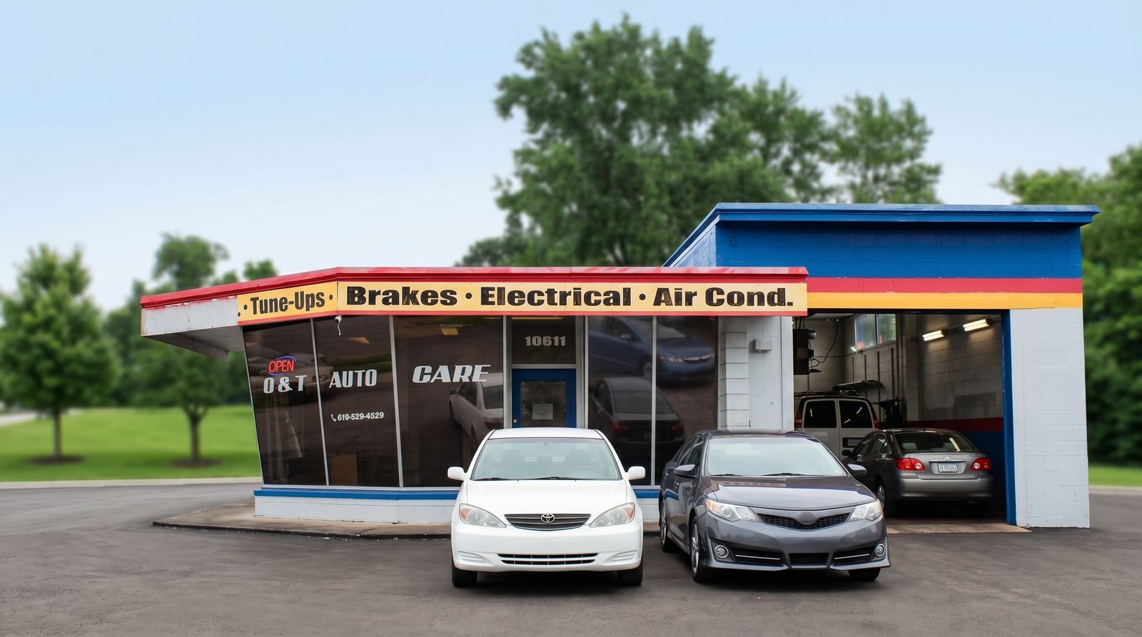 O & T Auto Care technician performing vehicle inspection in Kansas City